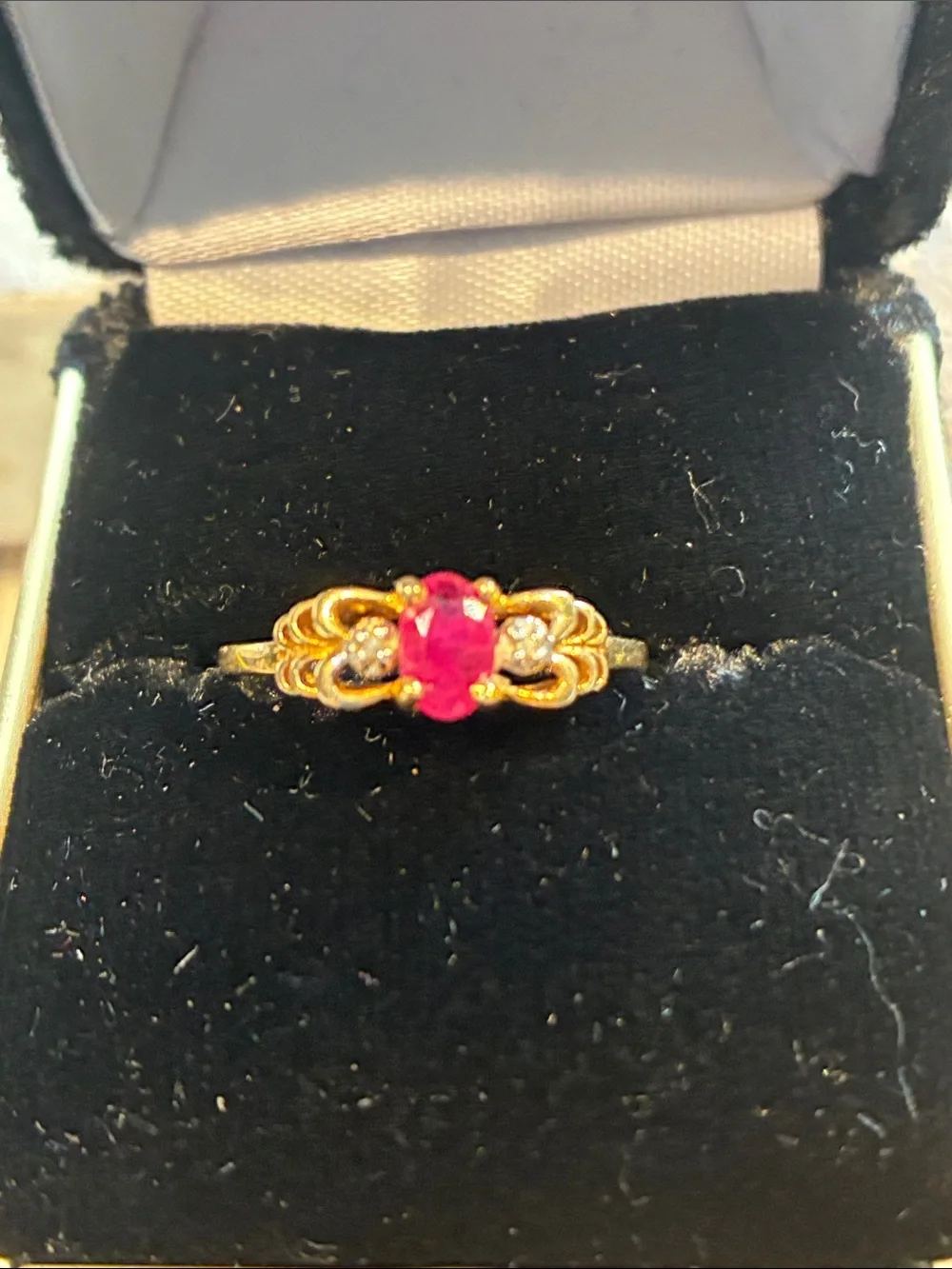 10K Gold Ring with Ruby Center Stone and Diamonds. 1.95 Grams Size 8